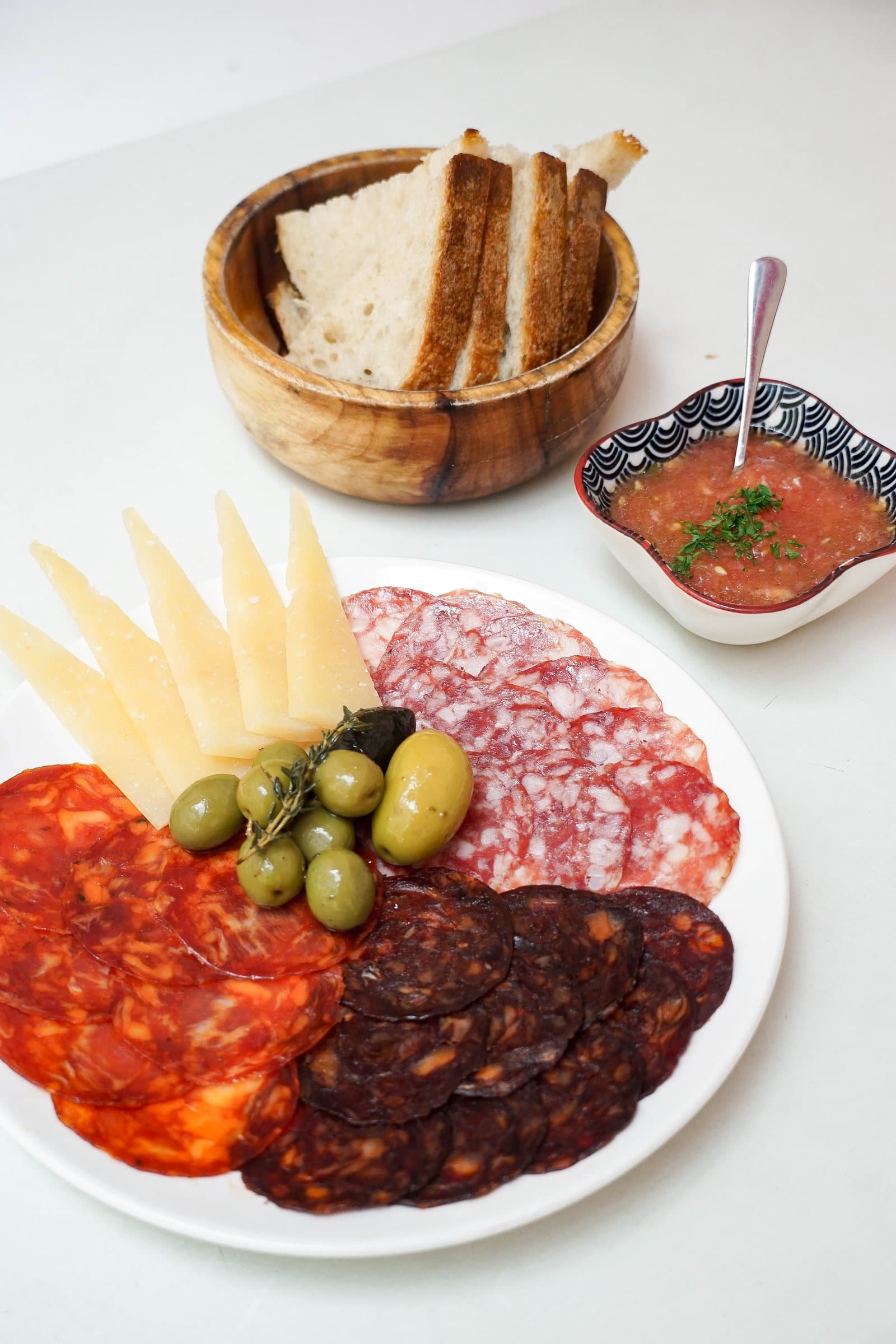 Chorizo, salchichón, olives and manchego spread