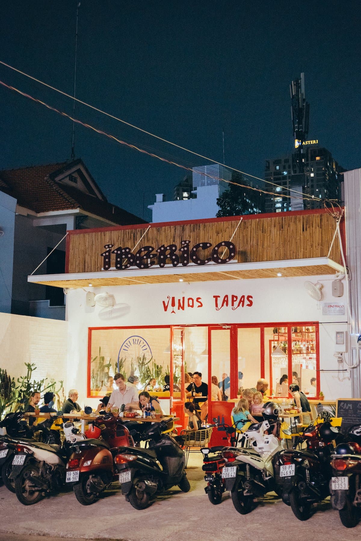 IBÉRICO storefront and street scene at night